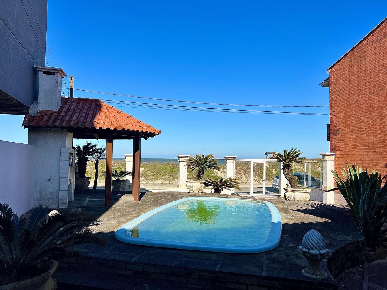 Casa 4 dormitórios para venda, BEIRA MAR  em Capão da Canoa | Ref.: 15405